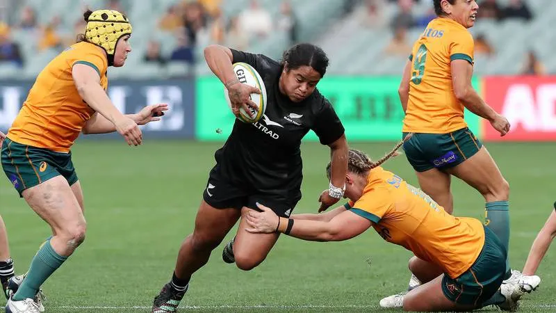 Black Ferns wing Ayesha Leti-I'iga is brought down by the Australian defence.